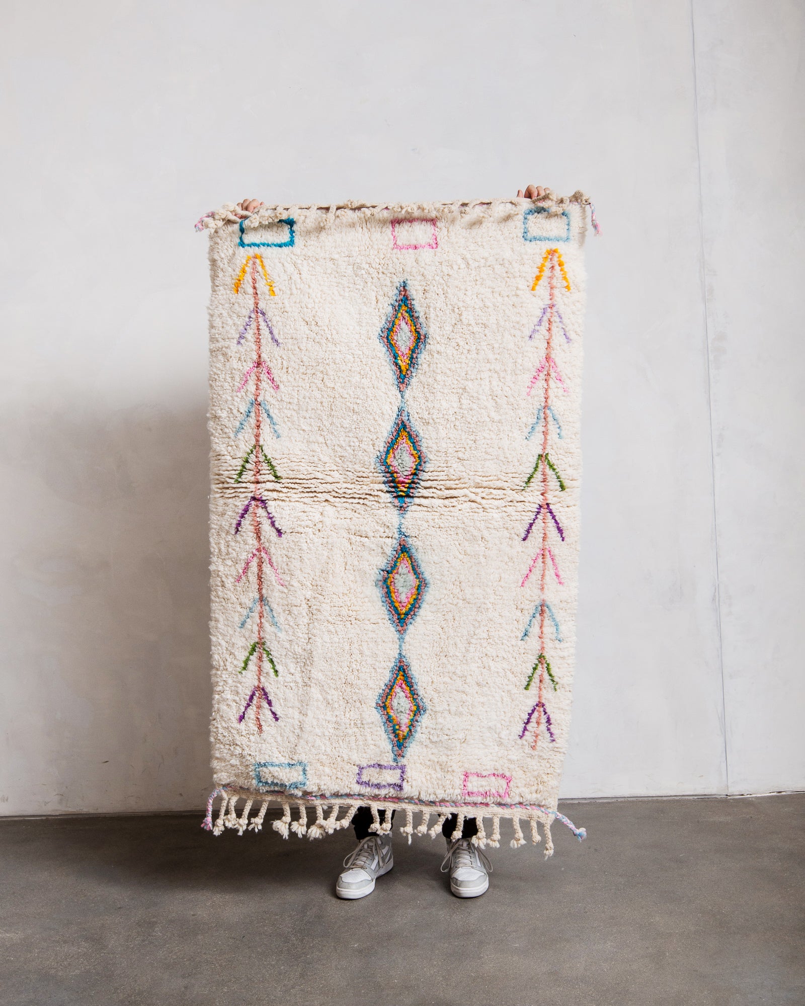 Modern, designer, handcrafted Berber rug from Morocco. Beniourain carpet with beautiful colours and patterns and fluffy wool texture.